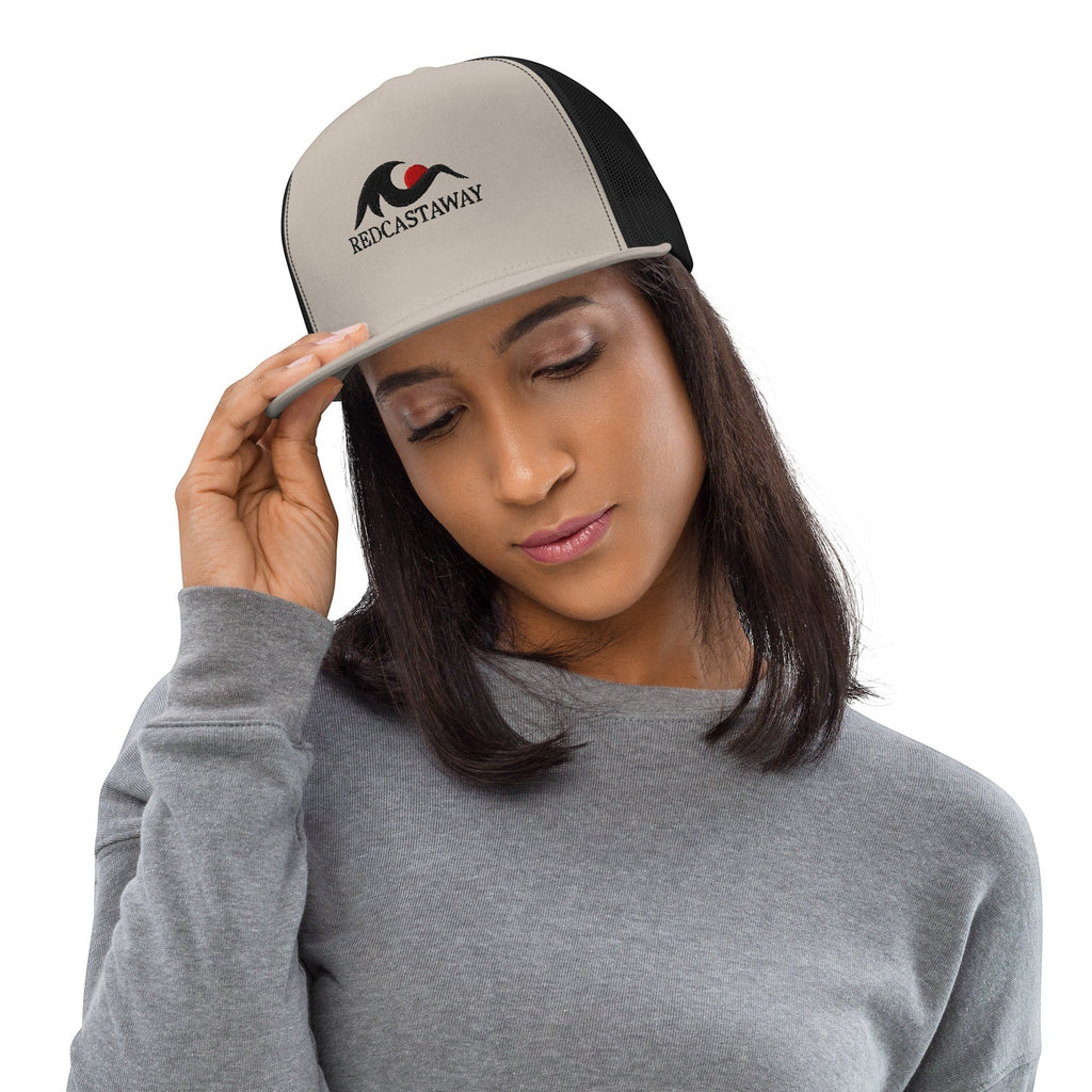 Redcastaway™ beige and black trucker cap with flat bill and embroidered logo. Cotton, nylon, polyester blend.