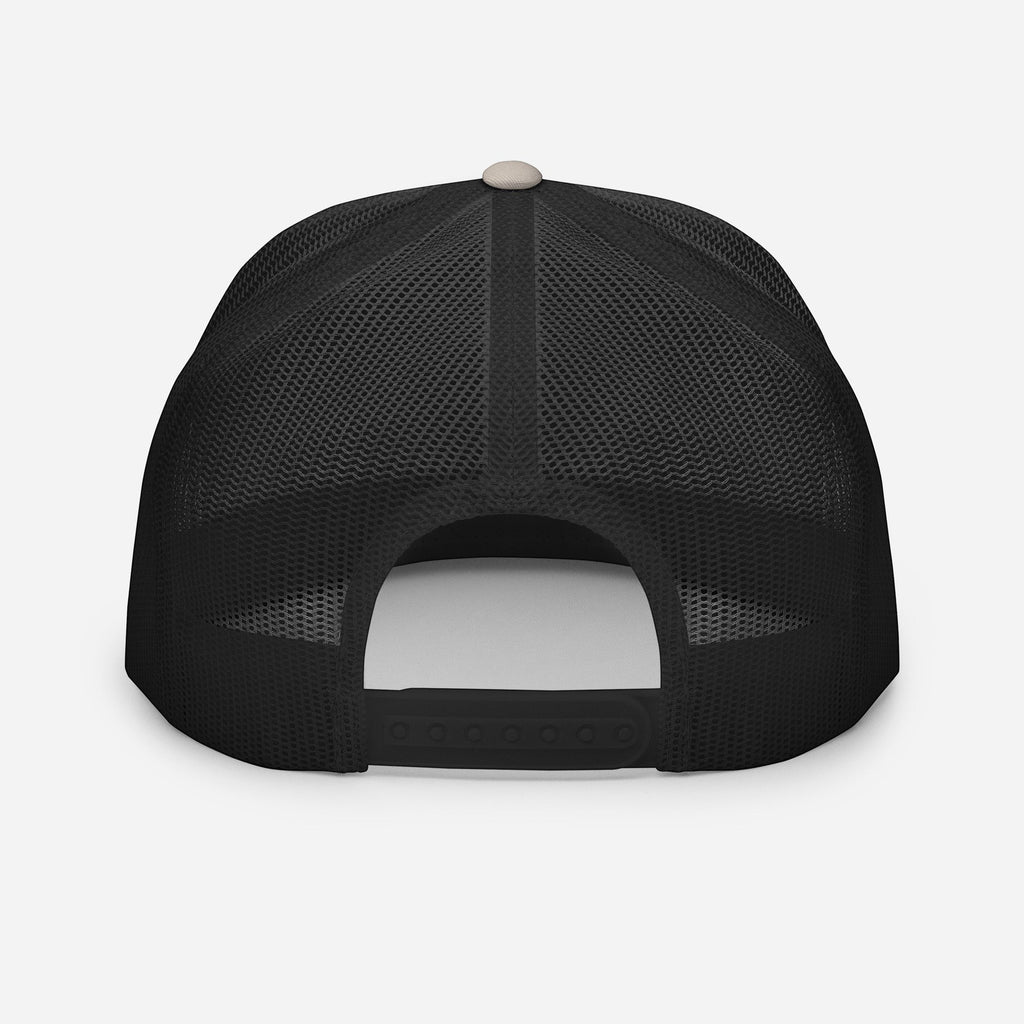 Redcastaway Drift Trucker Cap in black with a breathable mesh back and adjustable snapback closure. Cotton, nylon, polyester blend.