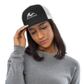 Redcastaway trucker cap with black front panel, white mesh back, and embroidered logo. Features a flat bill and snapback closure.