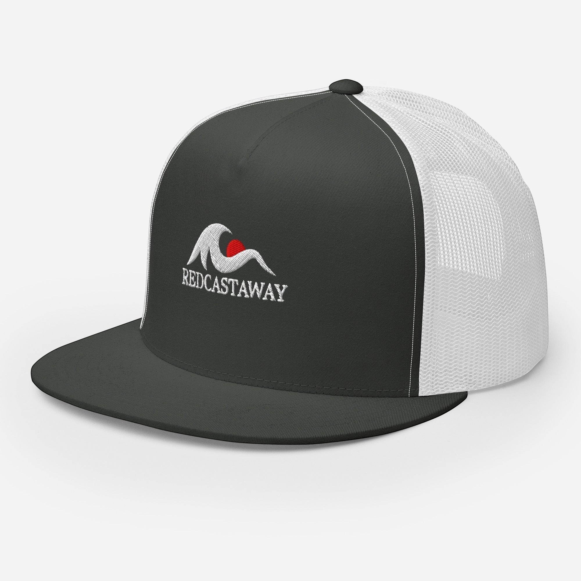 Redcastaway trucker cap in dark grey with white mesh back and embroidered logo. Features a flat bill and snapback closure.