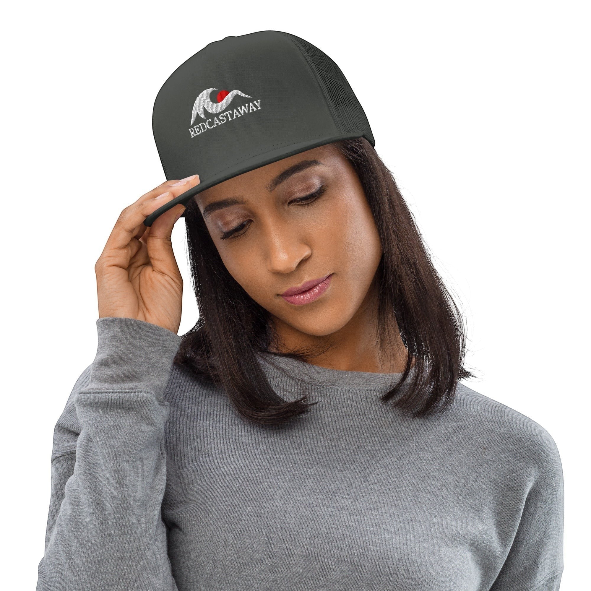 Redcastaway™ dark grey trucker cap with flat bill and embroidered logo, made from cotton, nylon, and polyester blend.