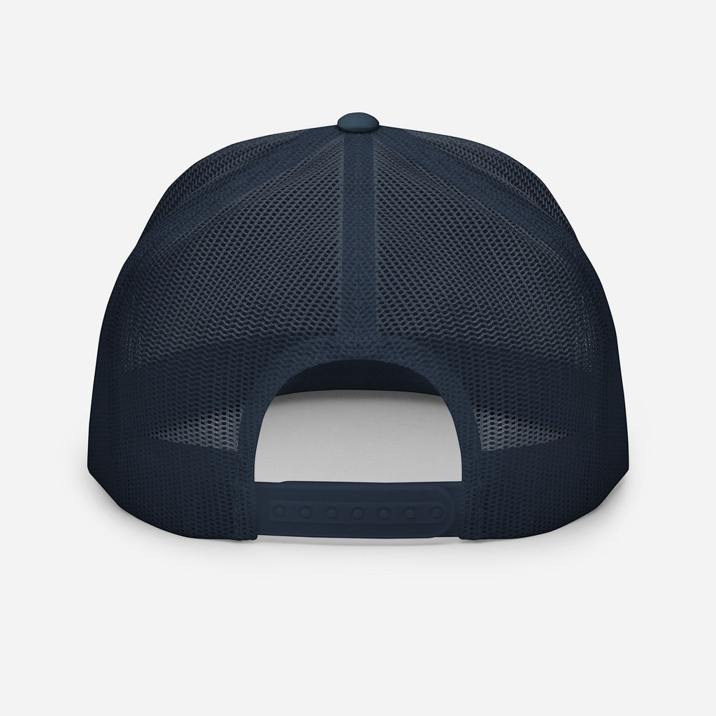 Redcastaway	rade navy blue trucker cap with mesh back and snapback closure. Cotton, nylon, polyester blend.