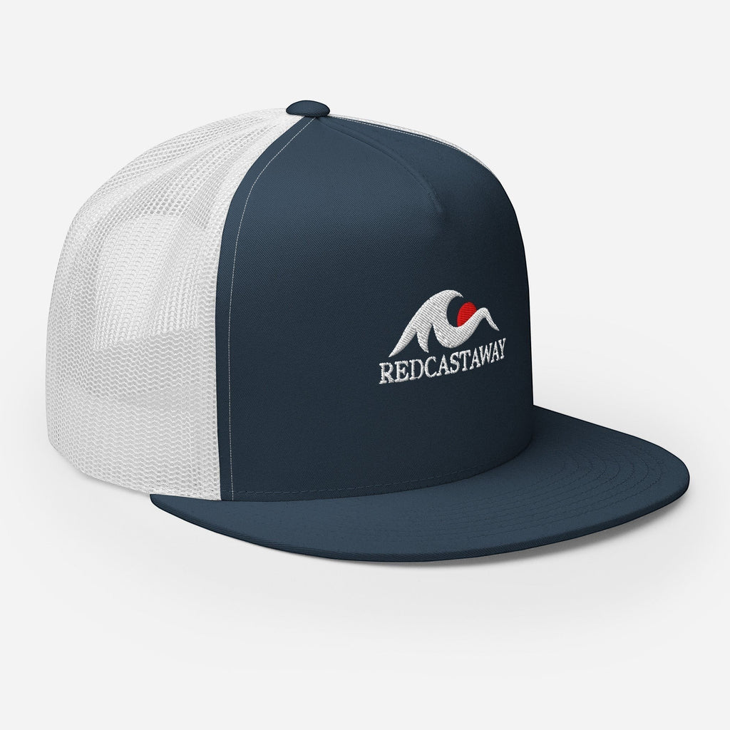 Redcastaway navy blue trucker cap with white mesh back and embroidered logo on front. Flat bill, snapback closure.
