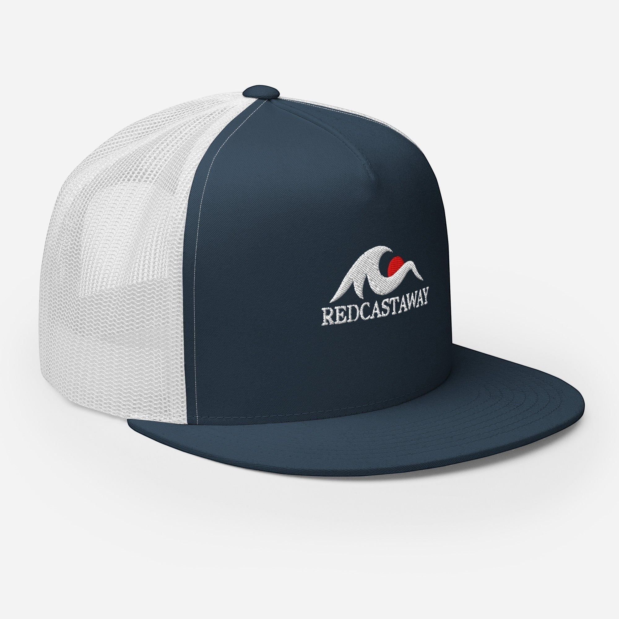 Redcastaway navy blue trucker cap with white mesh back and embroidered logo on front. Flat bill, snapback closure.
