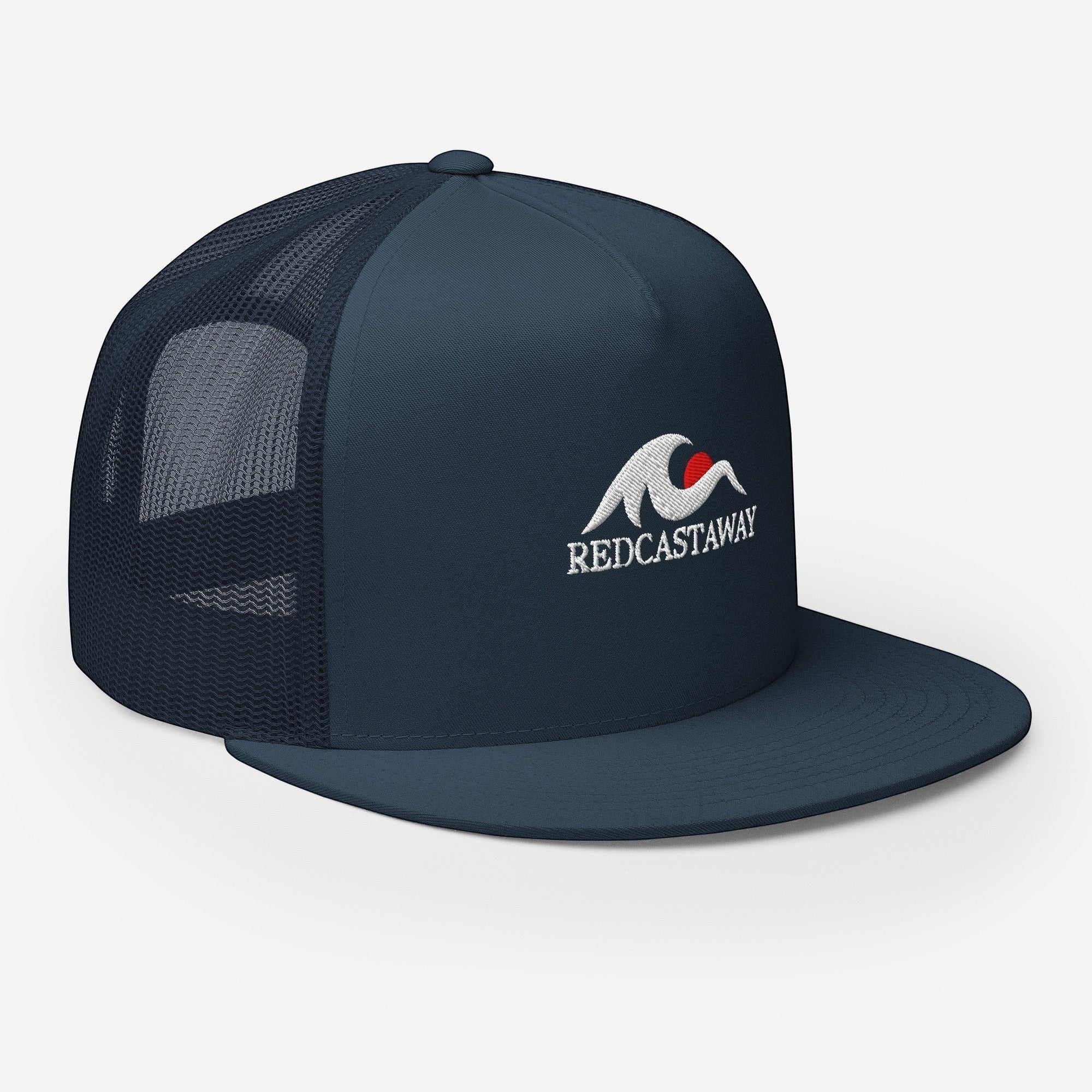 Redcastaway navy blue trucker cap with flat bill and embroidered logo. Cotton, nylon, polyester blend with snapback closure.