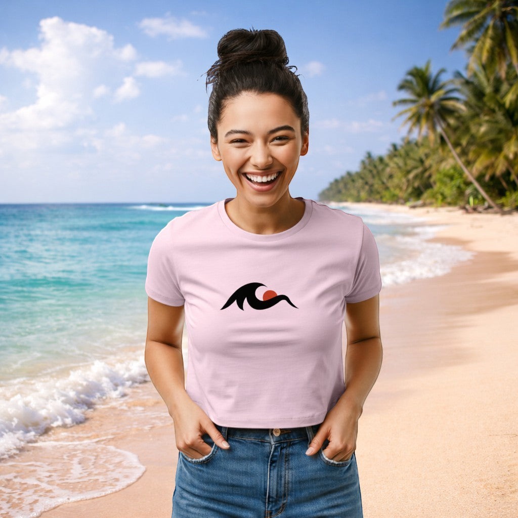 Redcastaway women's light pink cropped baby tee with crew neck and wave graphic. 60% cotton, 40% polyester.