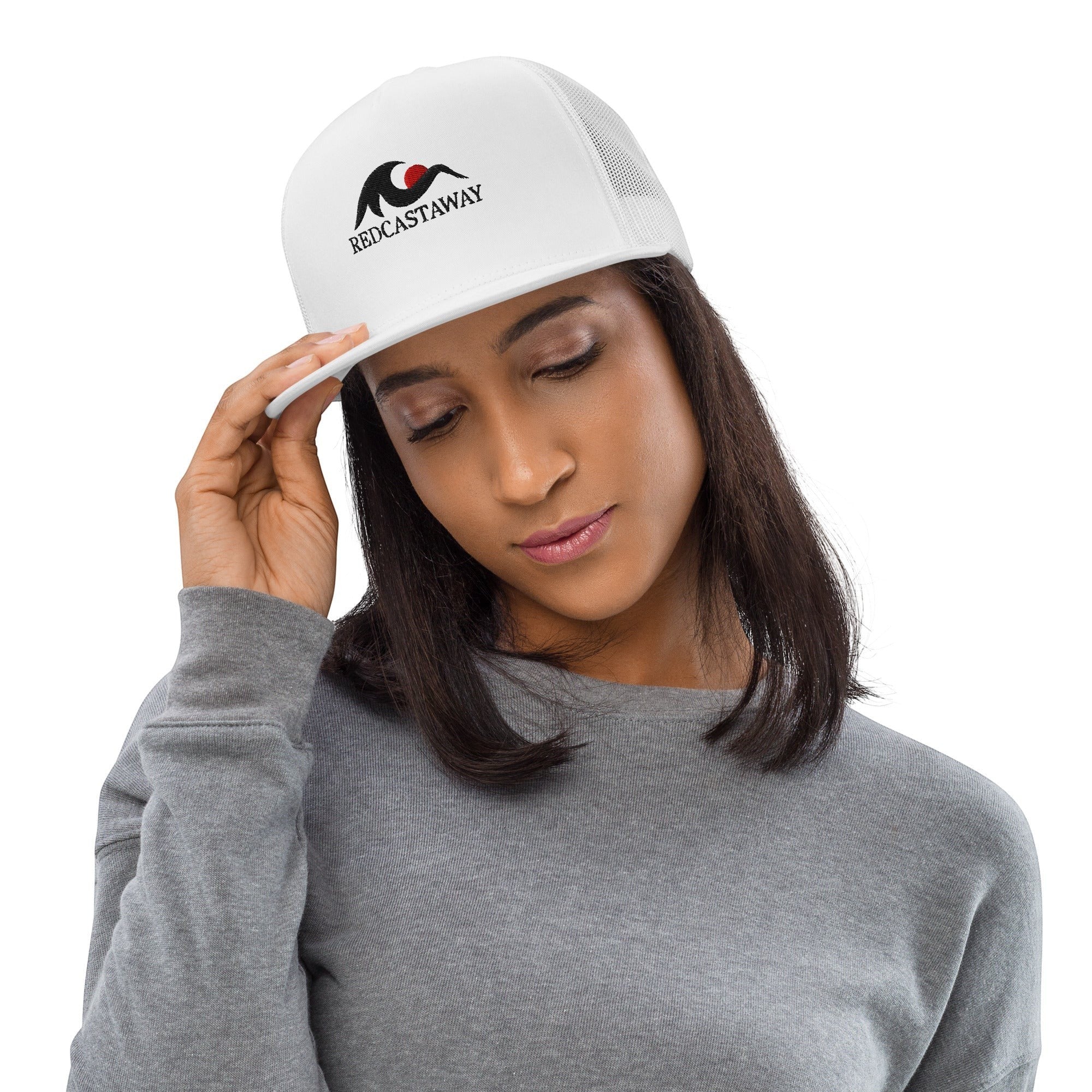 Redcastaway™ white trucker cap with flat bill and embroidered logo. Cotton, nylon, polyester blend with snapback closure.